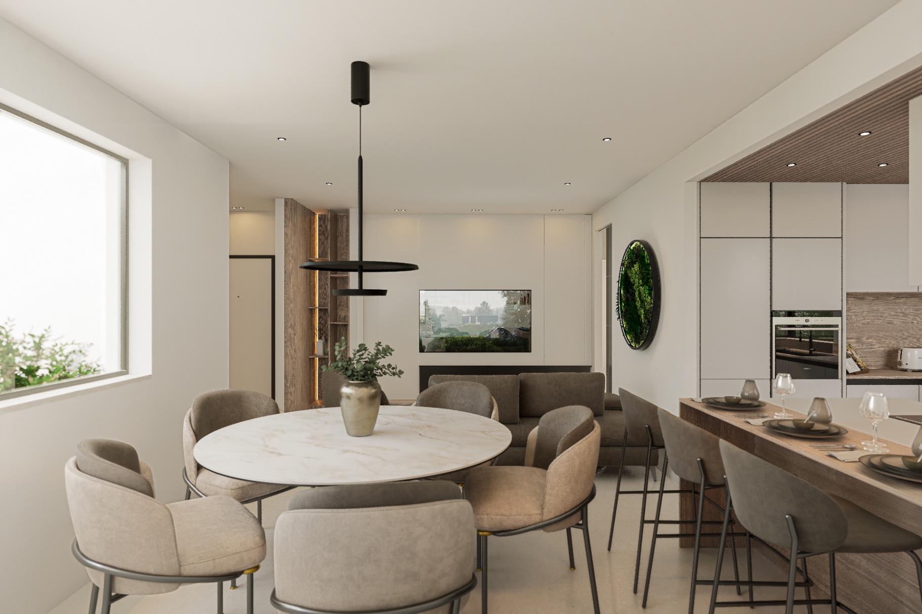 Zona pranzo con sospensione scultorea e cucina in continuità