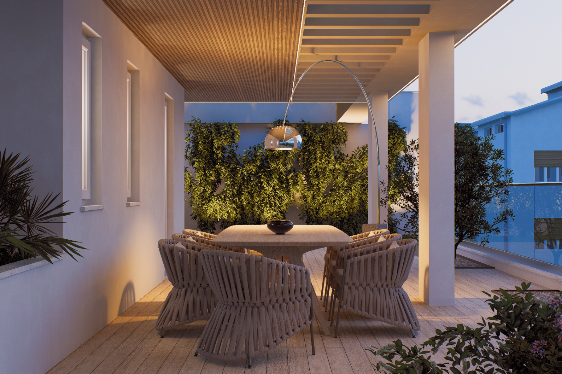 Terrazzo con pergola in legno e parete verde